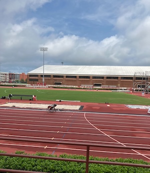 a photo of me racing at an adaptive track and field event
